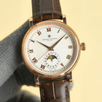Vacheron Constantin watch with cream-white dial, Roman numerals, gold case, brown leather strap.