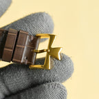 Vacheron Constantin watch clasp view with gold buckle and brown leather strap.