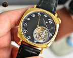 Vacheron Constantin watch with black dial, gold case, and visible internal movement