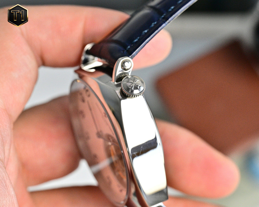 Vacheron Constantin watch back with metal crown and blue leather strap