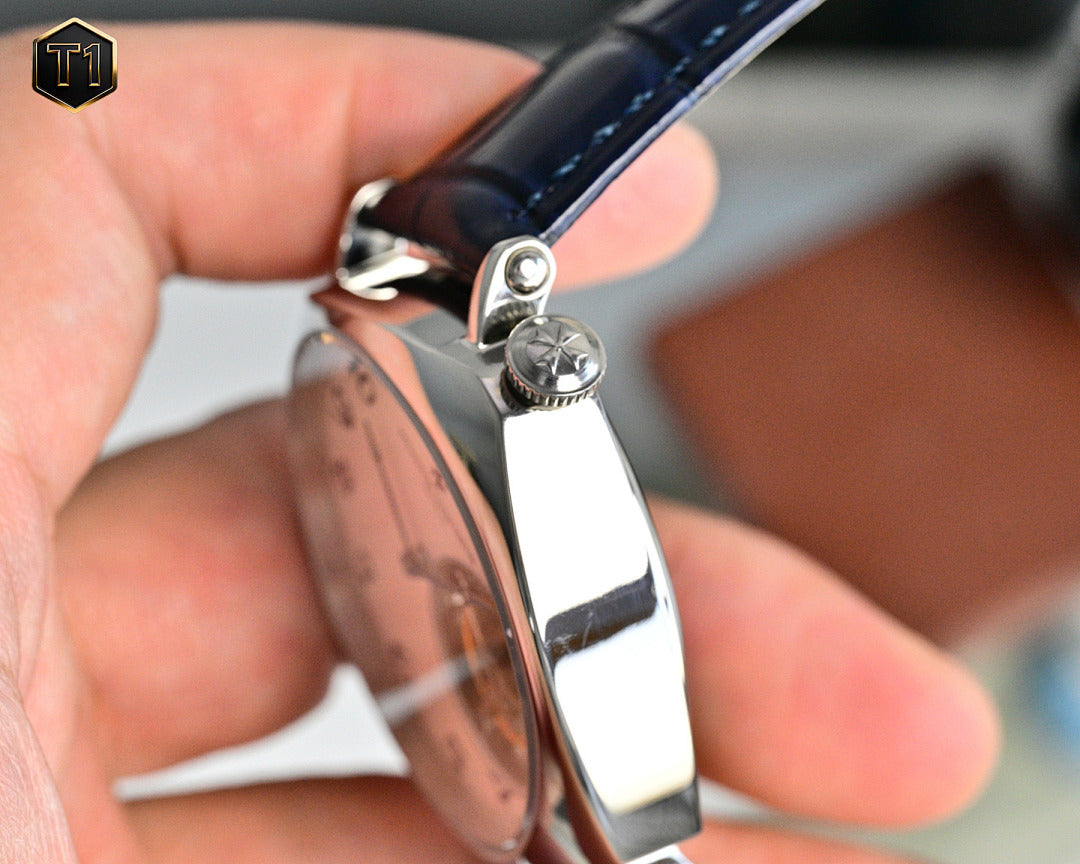 Vacheron Constantin watch back with metal crown and blue leather strap