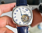 Vacheron Constantin watch with blue leather strap, white dial, and exposed movement
