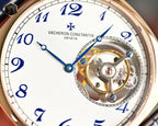 Vacheron Constantin wristwatch close-up of white dial with blue numerals and open movement
