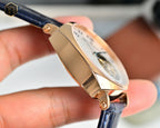 Vacheron Constantin wristwatch side profile with rose gold case and blue leather strap