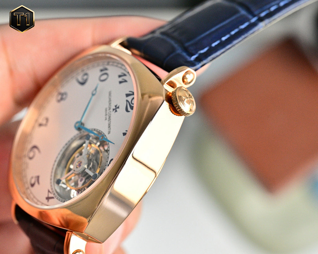 Vacheron Constantin wristwatch with rose gold case, blue leather strap, and open movement
