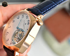 Vacheron Constantin wristwatch with rose gold case, blue leather strap, and open movement