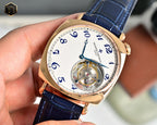 Vacheron Constantin wristwatch close-up of white dial, blue numerals, and open movement