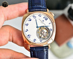 Vacheron Constantin wristwatch with white dial, blue numerals, skeleton movement, blue leather strap