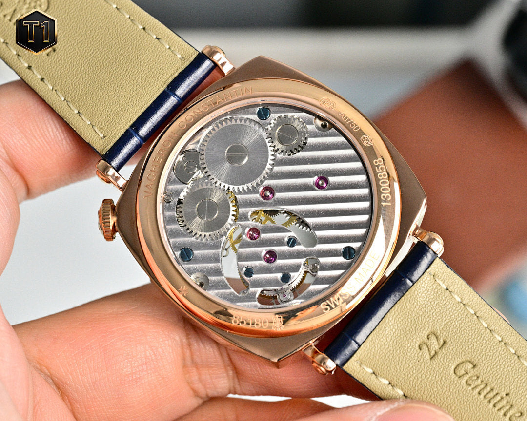 Vacheron Constantin wristwatch with open movement dial, rose gold case, blue leather strap