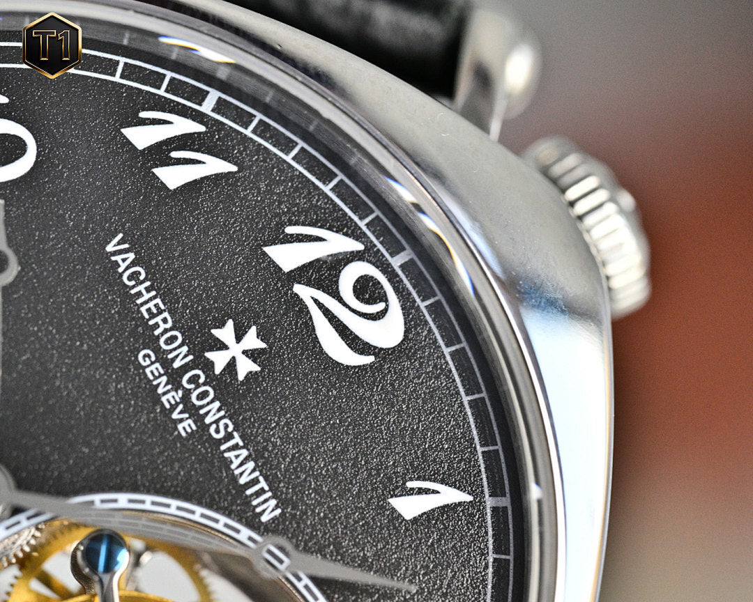 Vacheron Constantin watch bezel with roman numerals on black dial