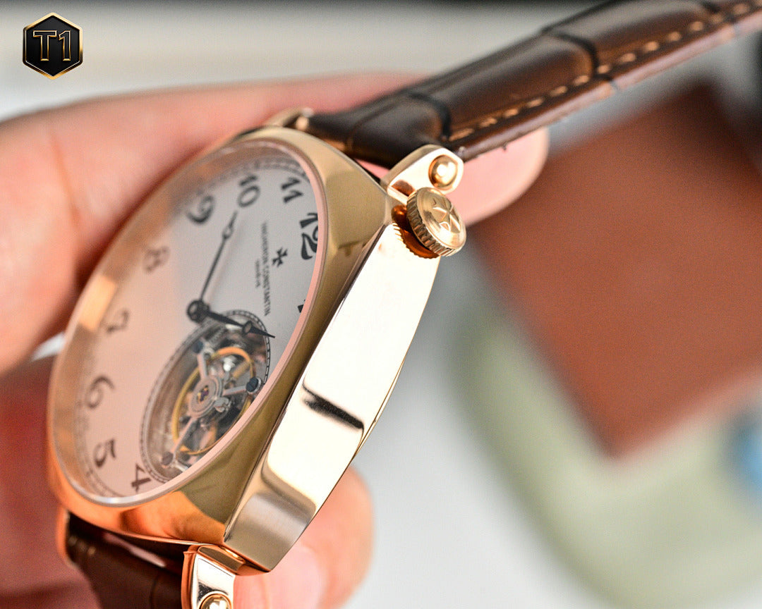 Vacheron Constantin watch side view with gold crown and brown leather strap
