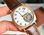 Vacheron Constantin watch angled front view with white dial, gold case, brown leather strap