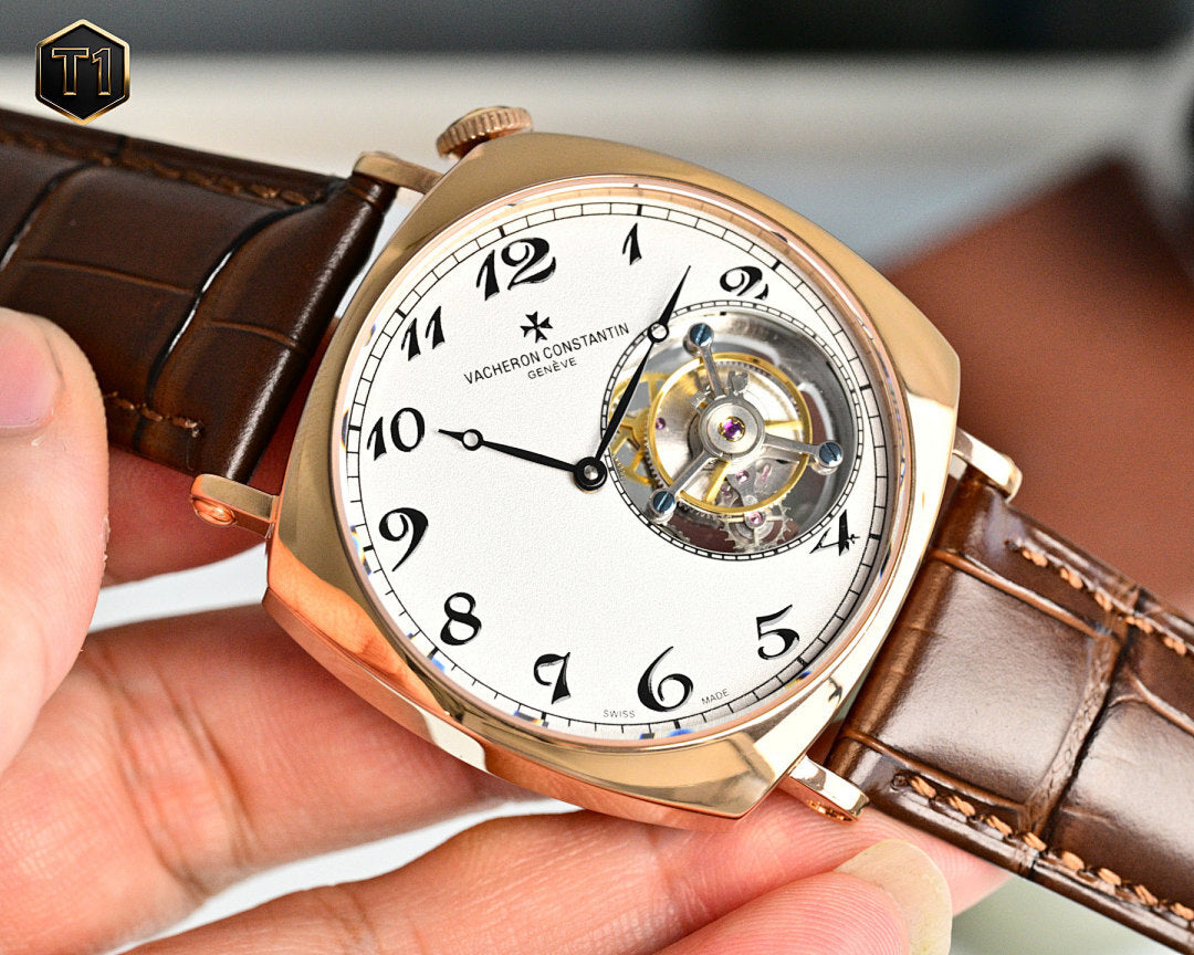 Vacheron Constantin watch three-quarter view with white dial and visible mechanical movement