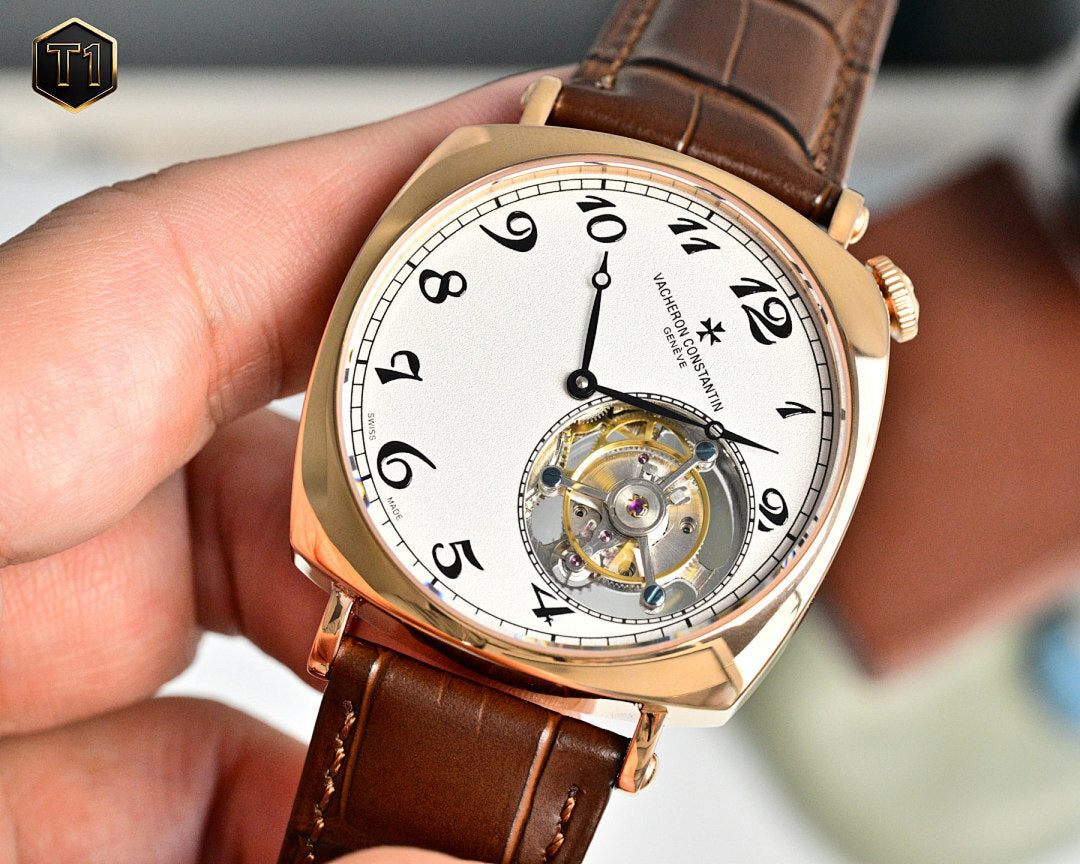Vacheron Constantin watch front view with white dial, gold case, and brown leather strap