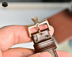 Vacheron Constantin watch buckle with brown leather strap and gold clasp