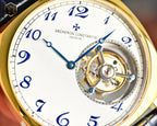 Vacheron Constantin close-up dial with blue hands, numerals, and visible movement