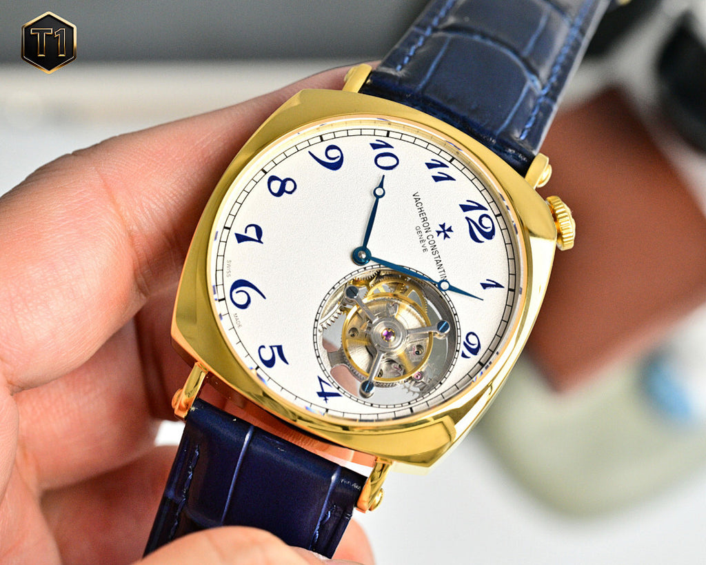 Vacheron Constantin watch with blue leather strap, gold case, and visible skeleton movement