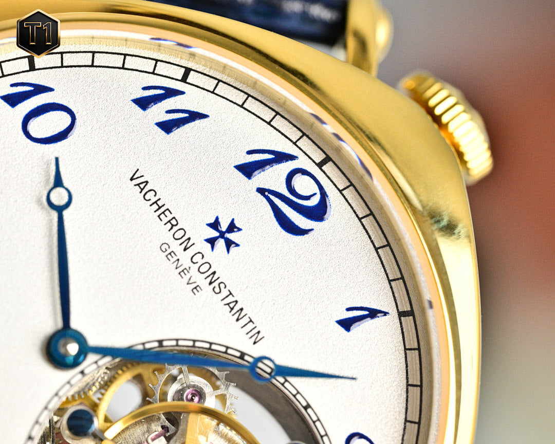 Vacheron Constantin watch face close-up with blue numerals and movement window