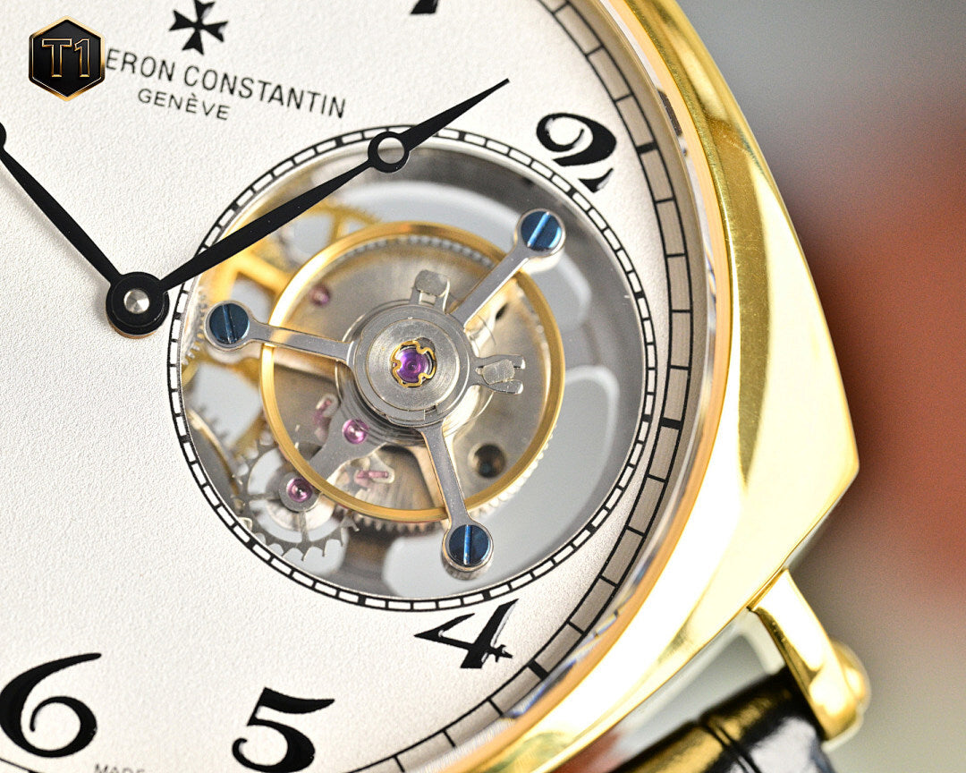 Vacheron Constantin watch movement close-up with white dial ring and gold case