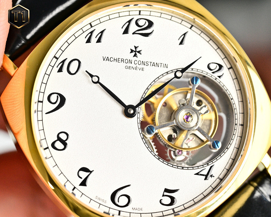 Vacheron Constantin watch face close-up with black leather strap and gold case