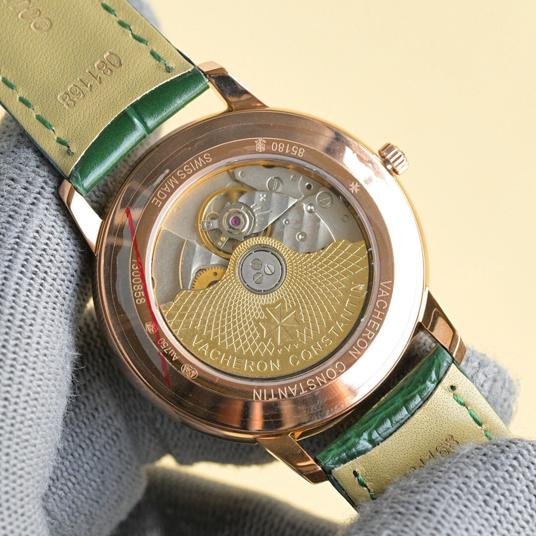 Vacheron Constantin watch case back with green leather strap, exposed mechanical movement