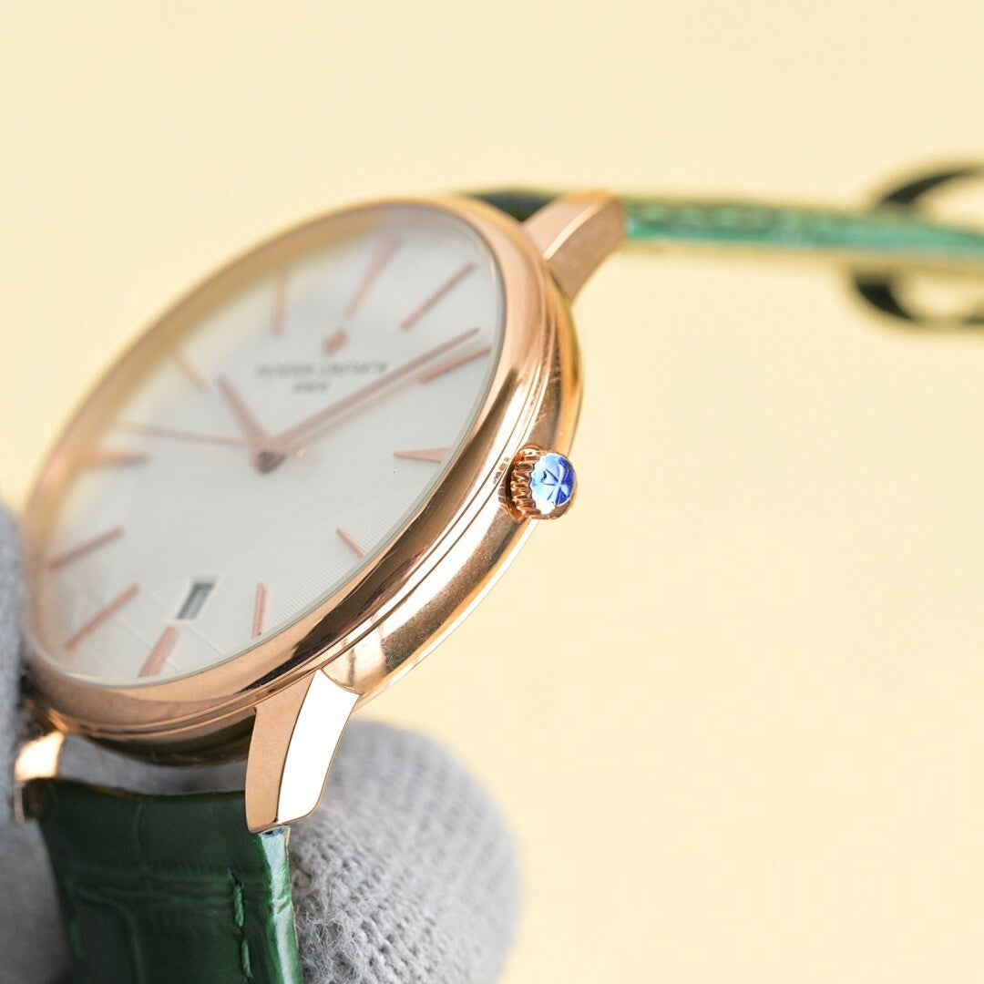 Vacheron Constantin watch with white dial, green leather strap, rose-gold crown detail