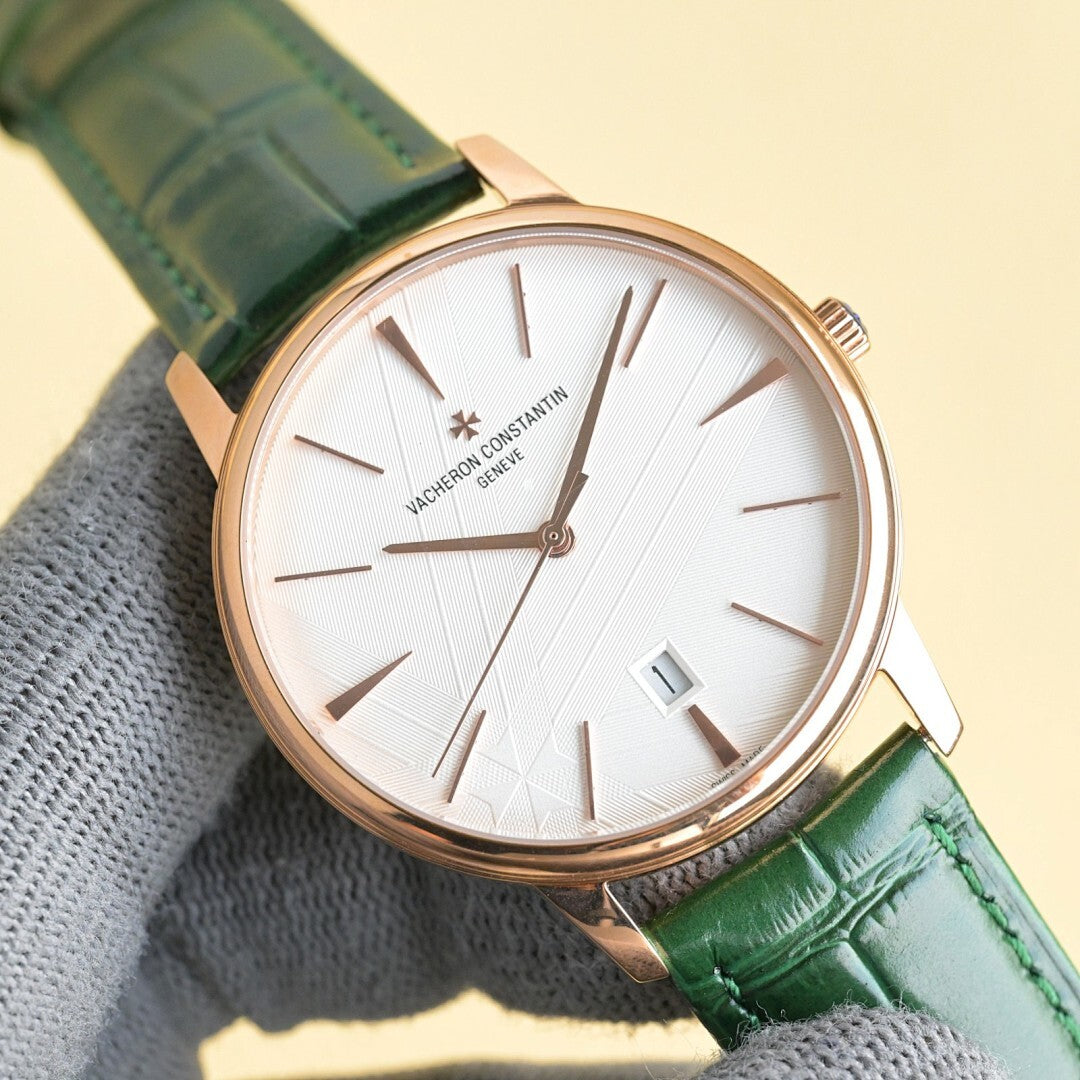 Vacheron Constantin wristwatch with white dial, green leather strap, rose-gold case