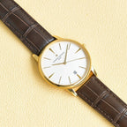 Vacheron Constantin watch with white dial, gold markers, brown leather strap
