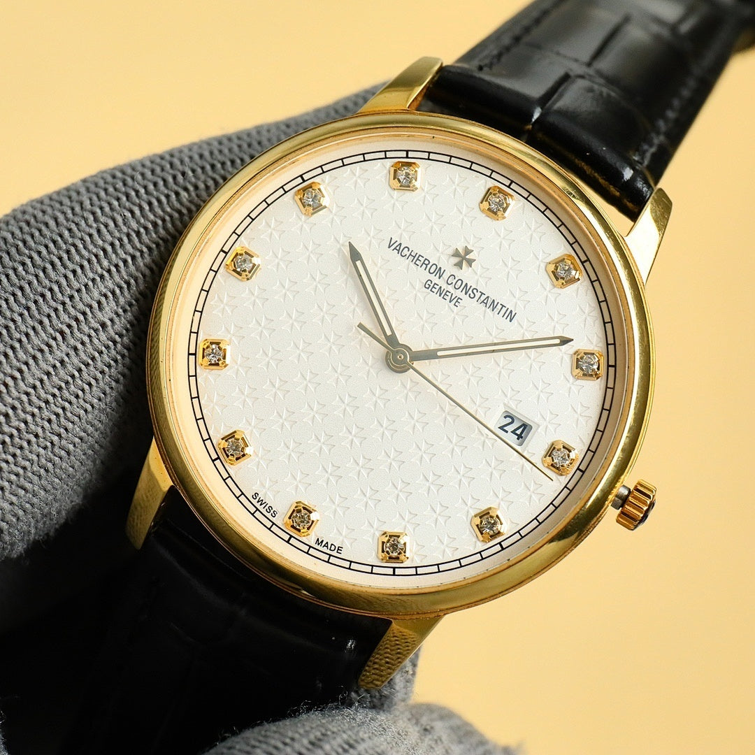 Gold Vacheron Constantin watch with white dial, diamond markers, black leather strap