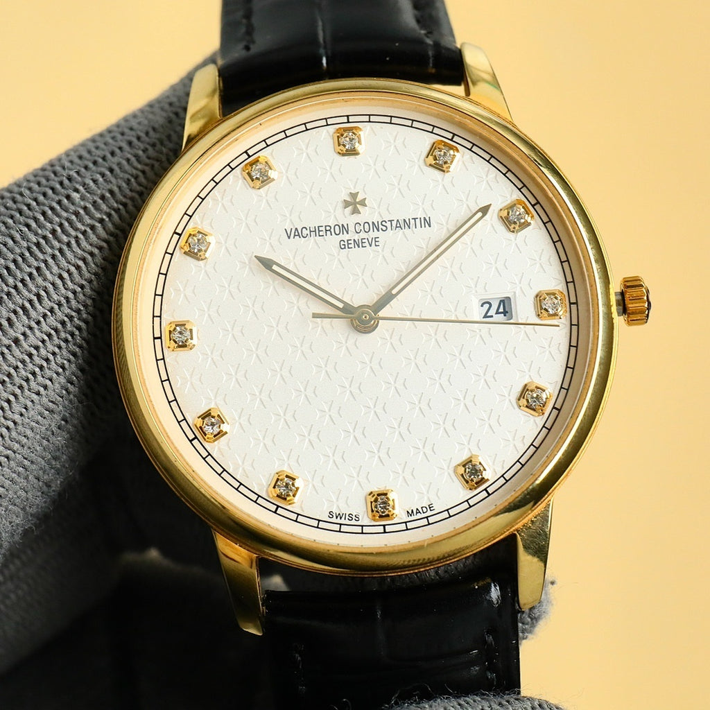 Gold Vacheron Constantin watch with white dial, diamond markers, black leather strap