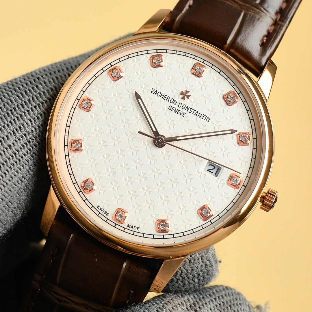 Gold Vacheron Constantin watch with white dial, red diamond markers, black leather strap