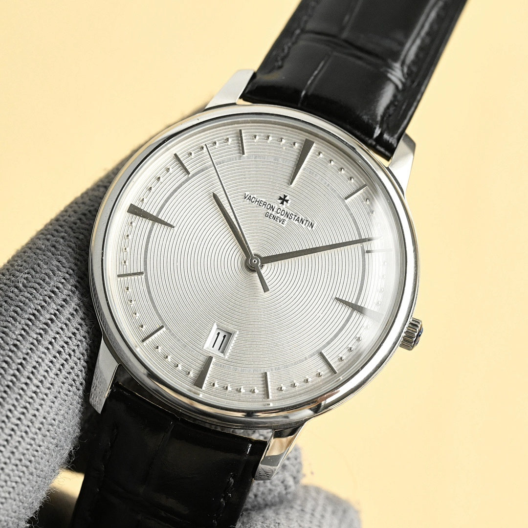 Vacheron Constantin watch with silver dial and black leather strap, angled view