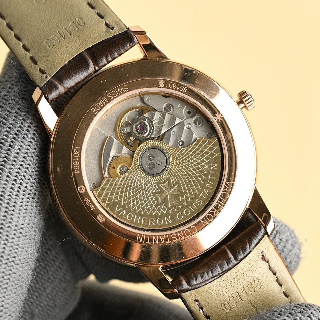 Vacheron Constantin watch with open caseback showing mechanical movement, brown strap