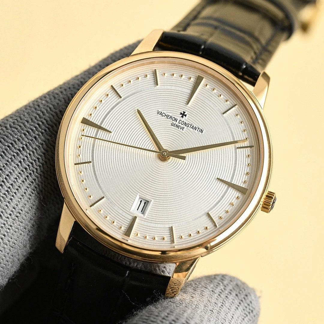 Luxury wristwatch with white dial, gold markers, black leather strap and analog hands