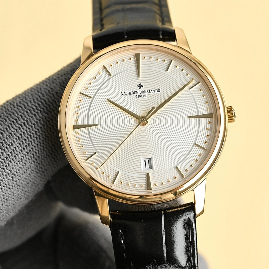 Luxury wristwatch with white dial, gold case, black leather strap and Roman-style markers