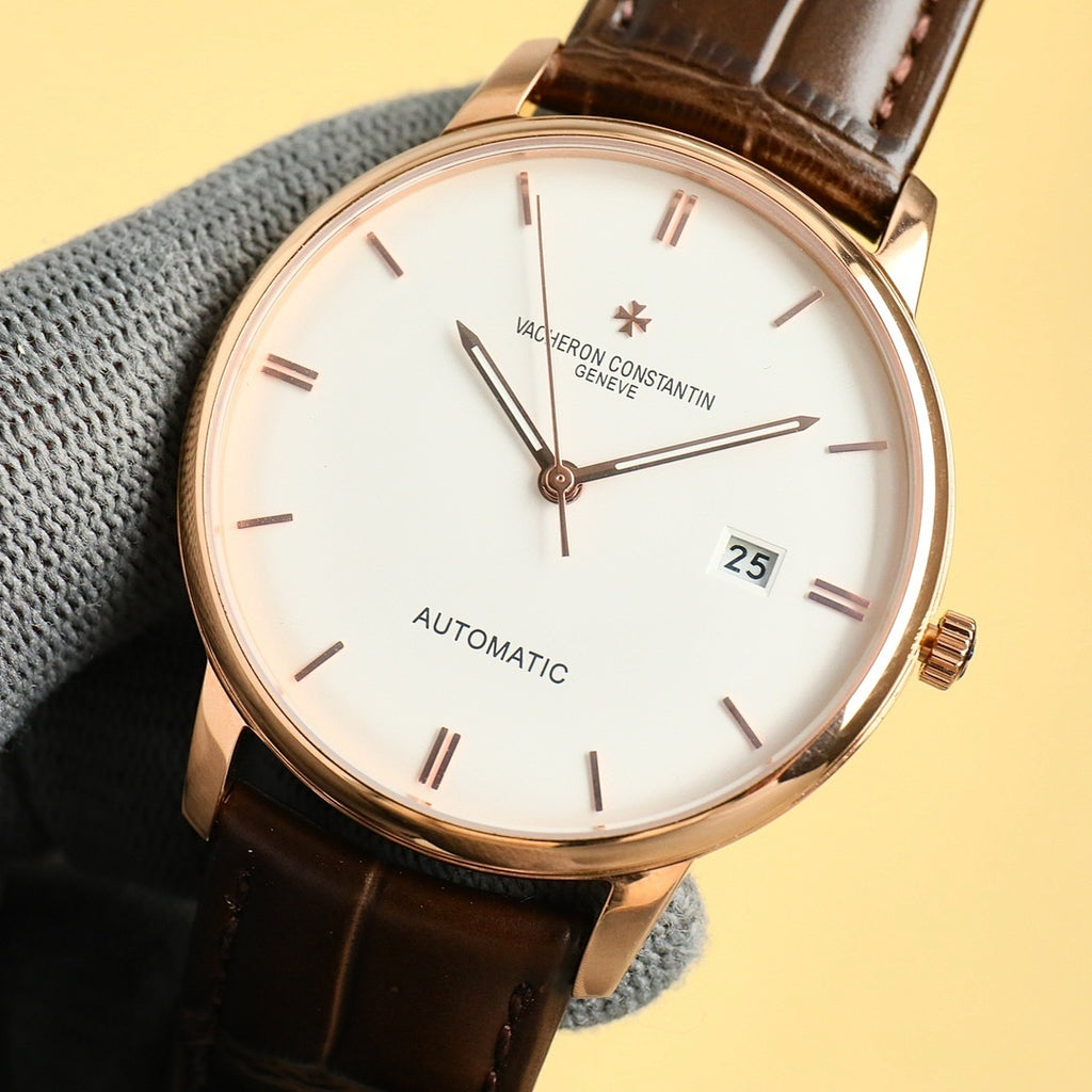 Vacheron Constantin automatic wristwatch with white dial, gold-tone case, date 25, brown strap