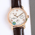 Rose-gold-tone wristwatch with white dial, Roman numerals, brown leather strap, date subdial.