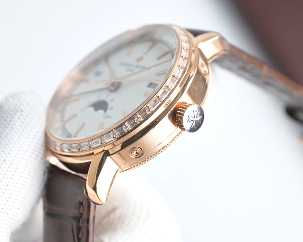 Rose-gold watch side with textured crown and diamond accents, brown leather strap