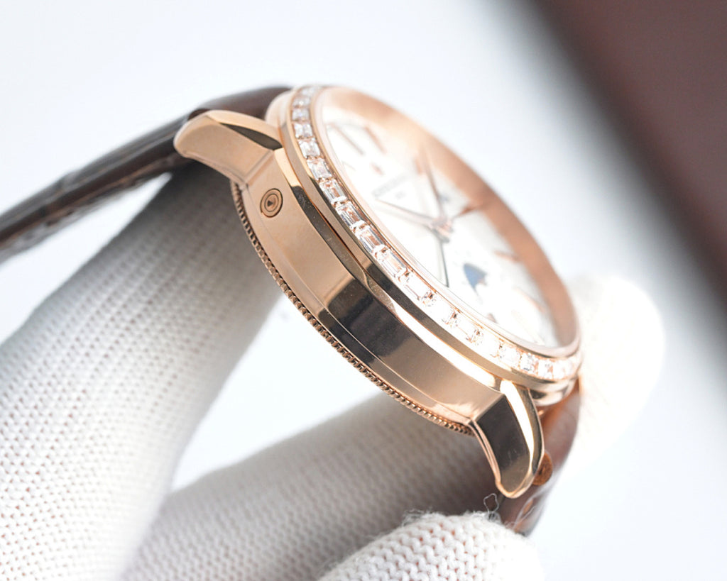 Rose-gold watch case in side profile, crystal bezel and brown leather strap