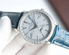 Luxury wristwatch three-quarter view with white dial, silver case, and blue leather strap.