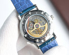 Luxury wristwatch with transparent caseback showing colorful mechanical movement; blue strap.