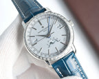 Luxury wristwatch angled view with white dial, silver bezel, and blue leather strap; day/date.
