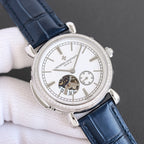 Silver watch with white dial, subdials, and blue leather strap