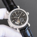 Silver watch with black dial, white indices, and black leather strap, diamond bezel detail