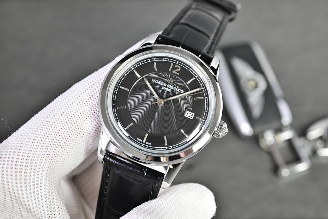 Vacheron Constantin round watch with black dial and black leather strap