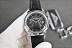 Vacheron Constantin round watch with black dial and black leather strap