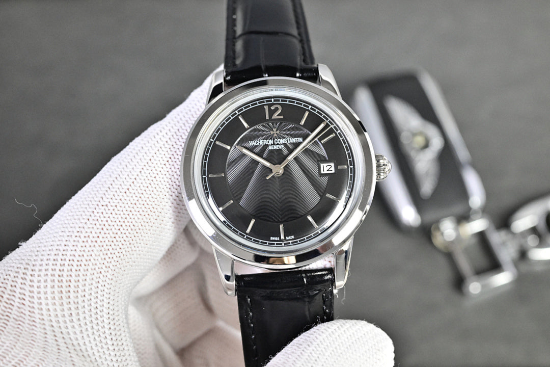 Vacheron Constantin round watch with black dial and black leather strap