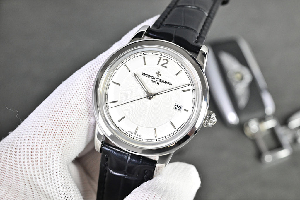 Vacheron Constantin round watch with white dial and black leather strap