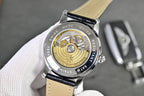 Vacheron Constantin watch caseback with gold-toned movement and black leather strap