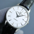 Close-up automatic wristwatch with white dial and black leather strap, date at 7